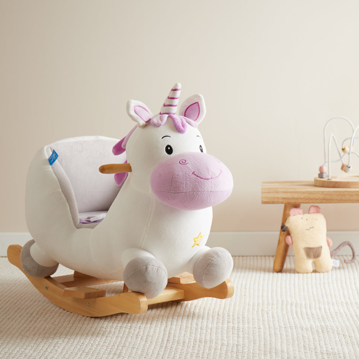 Schaukeltier Baby Einhorn Hörnchen